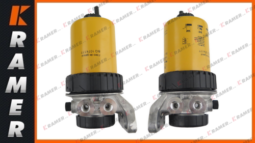 1383096 Filtr paliwa + pompka CAT 416B 416C 416D 420D 424D 426C 428B 428C 428D 430D 432D 436C 438C 438D 442D 307 312 312B 312C 315 315B 317 M312  M315 906 908 914G Filtr paliwa / Fuel filter Spin-On / Топливный фильтр / паліўны фільтр /